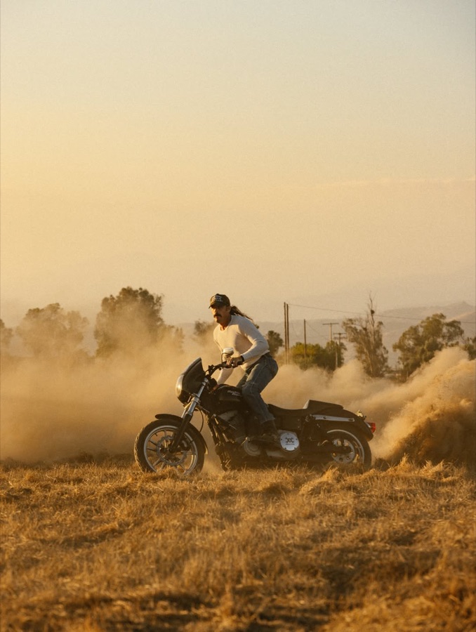 Jarrod Anthonee — Harley rider kicking up golden dust