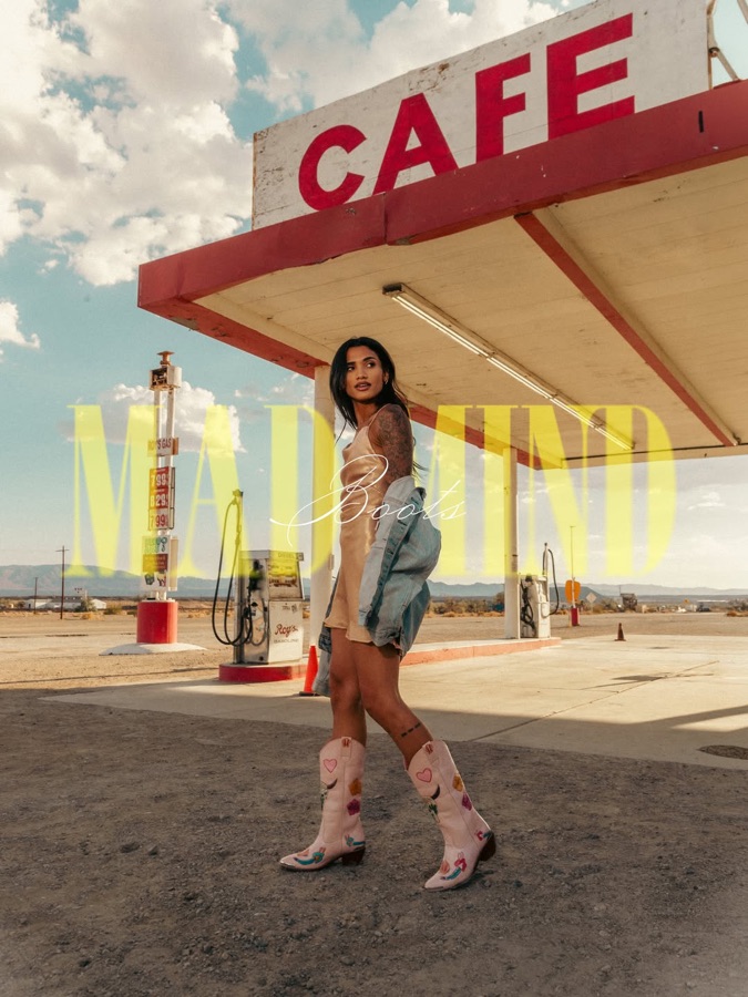 Kayden Muzila — western boots campaign at a desert café